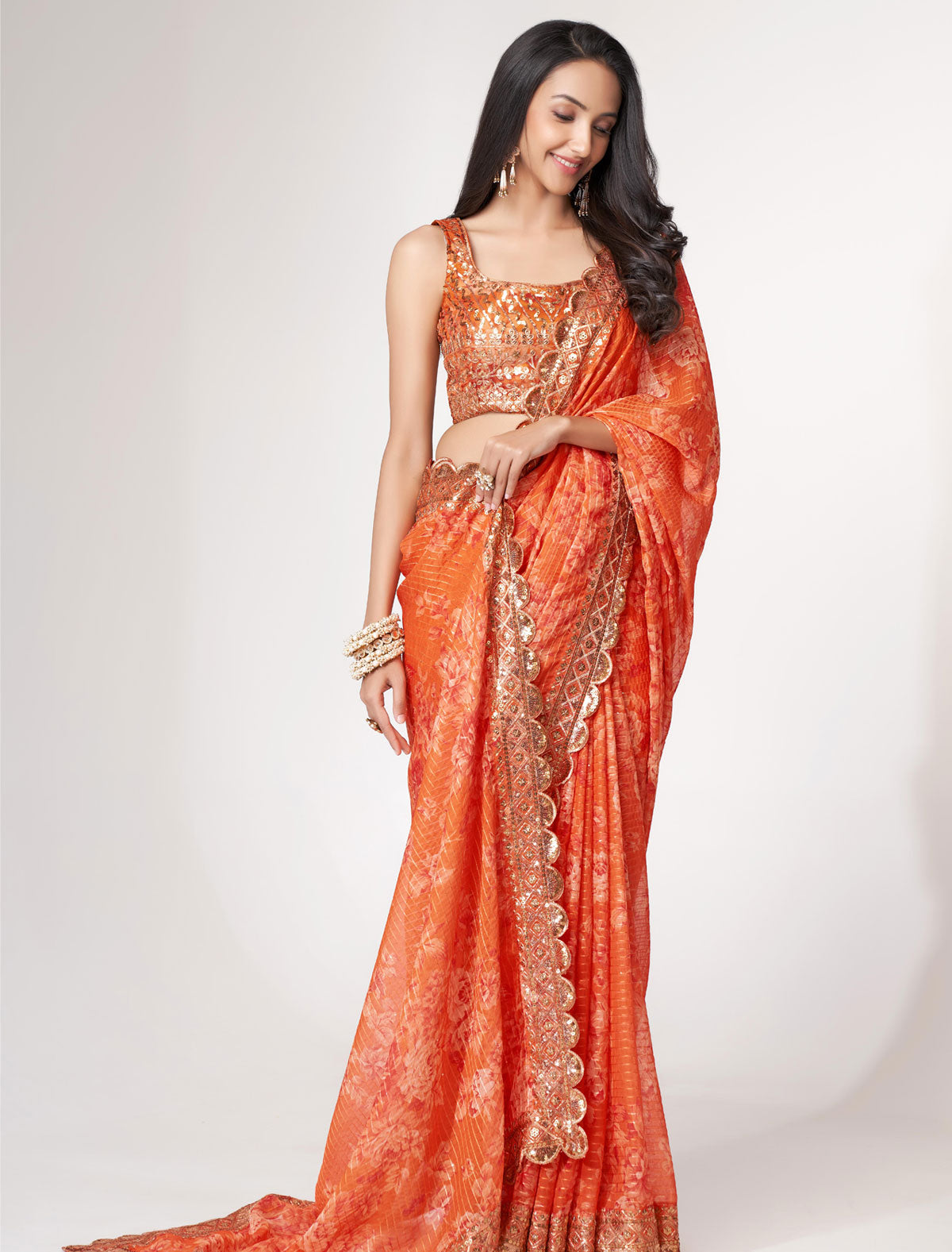 Shop the Elegance of Orange Organza Saree with Sequins Embroidery | befashionate
