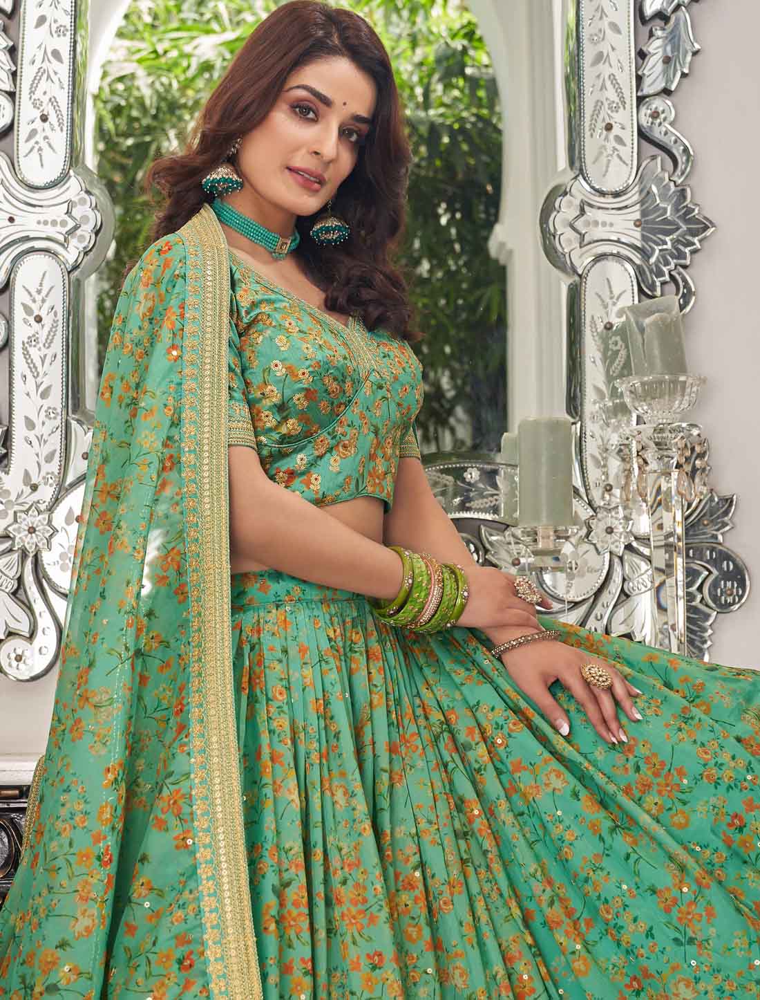 Pista Ethnic Art Silk Embroidery Work Lehenga Choli