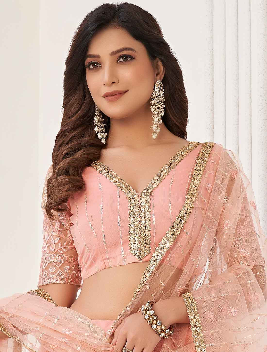 Peach Ethnic Embroidery Designer Semi-Stitched Lehenga Choli