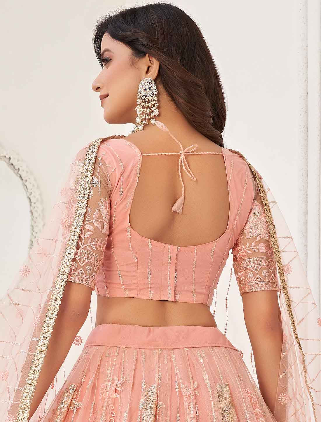 Peach Ethnic Embroidery Designer Semi-Stitched Lehenga Choli