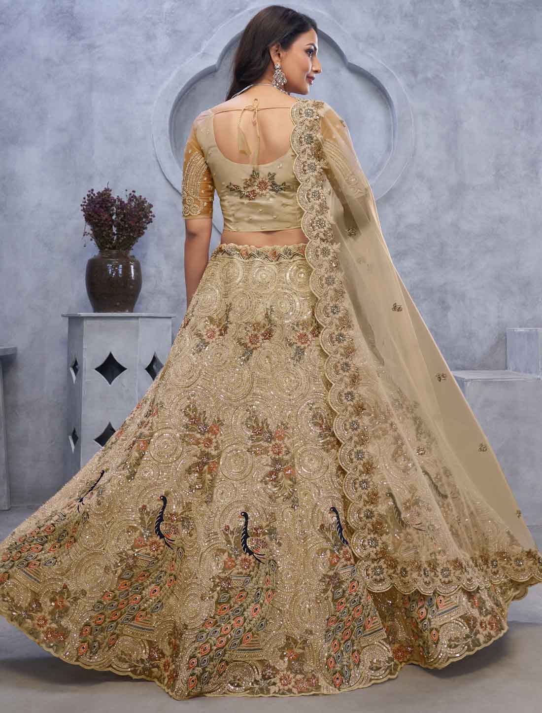 Ethnic Alluring Bel Butti pattern Golden Sangeet Lehenga Choli