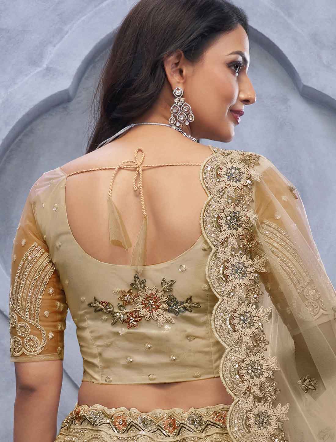 Ethnic Alluring Bel Butti pattern Golden Sangeet Lehenga Choli