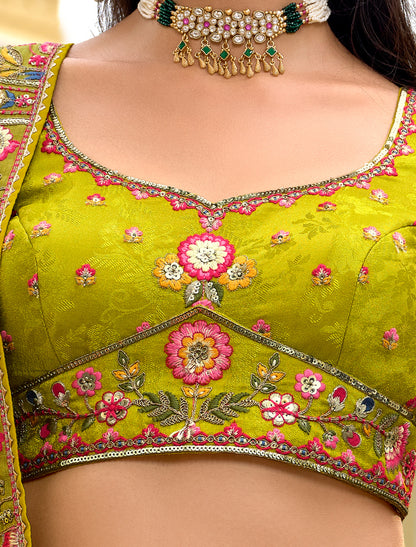 Ethnic Pista Green Fancy Silk An Net Hevay Embroidery Lehenga Choli