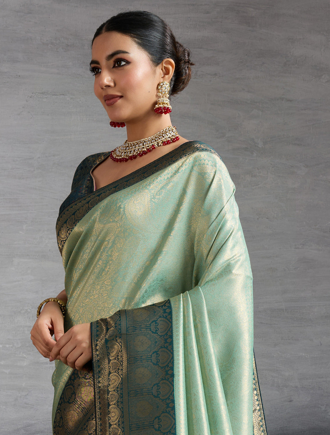 Teal Green Kanjivaram Silk Party Wear Zari Woven Meenakari Saree