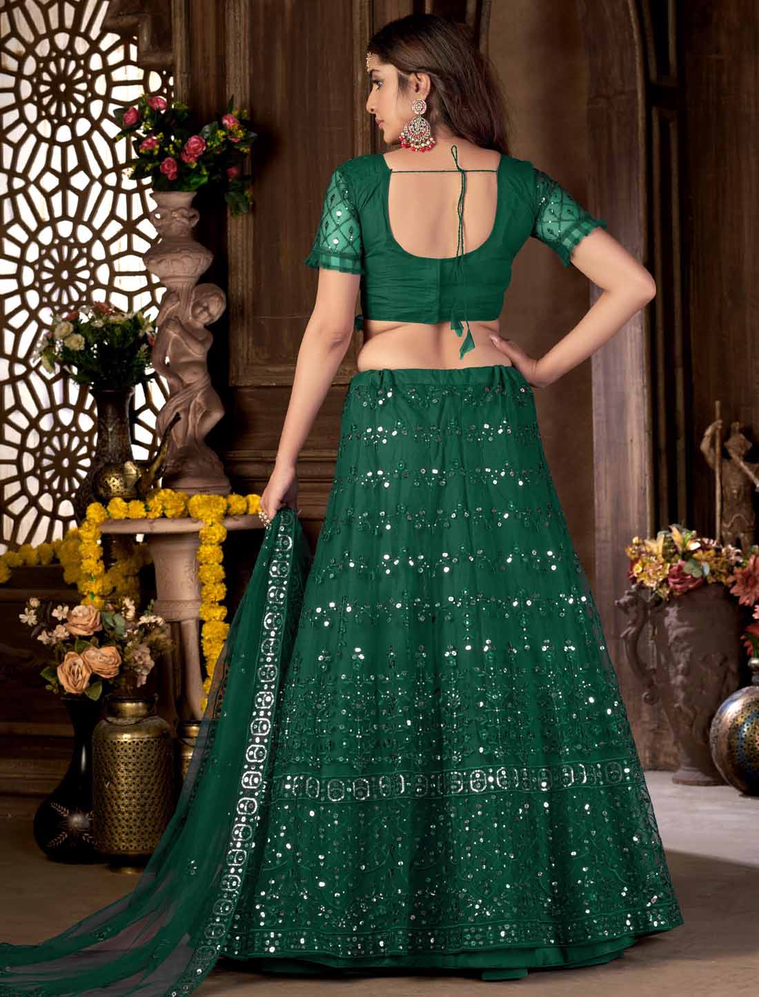 Dark Green Net With Ethnic Multi Embroidered Mirror Lehenga Choli