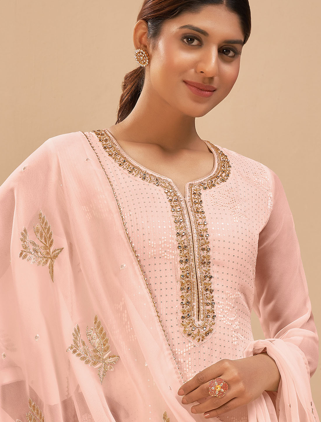 Peach Georgette Crafted With Thread And Sequins Designer Kurti Sets