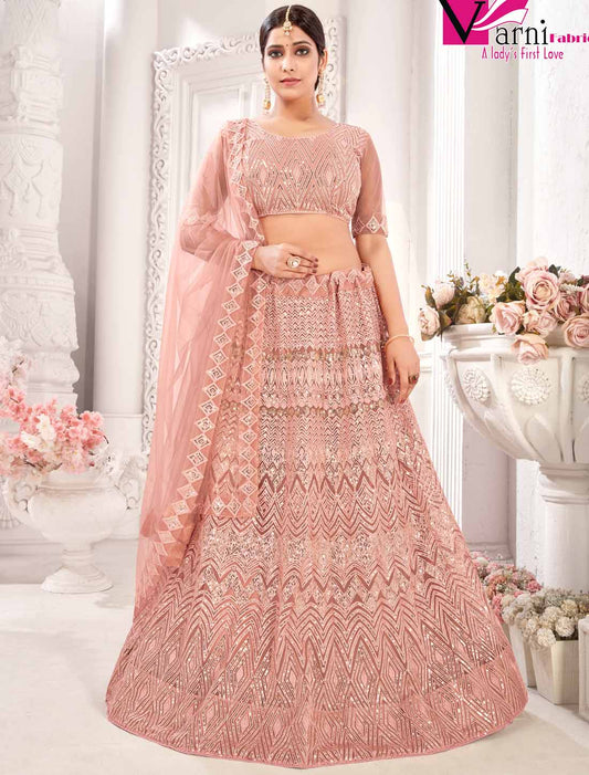 Peach Traditional Net With Ethnic Embroidered Lehenga Choli