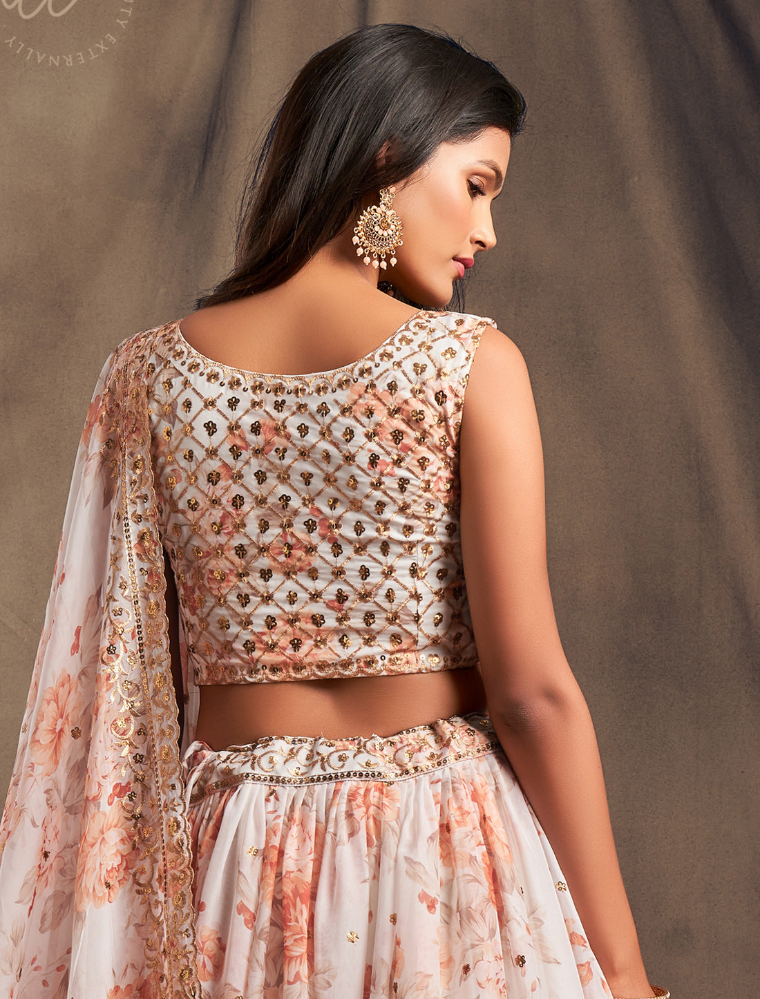 Ethnic White Organza Lehenga Choli With Sequins Embroidery